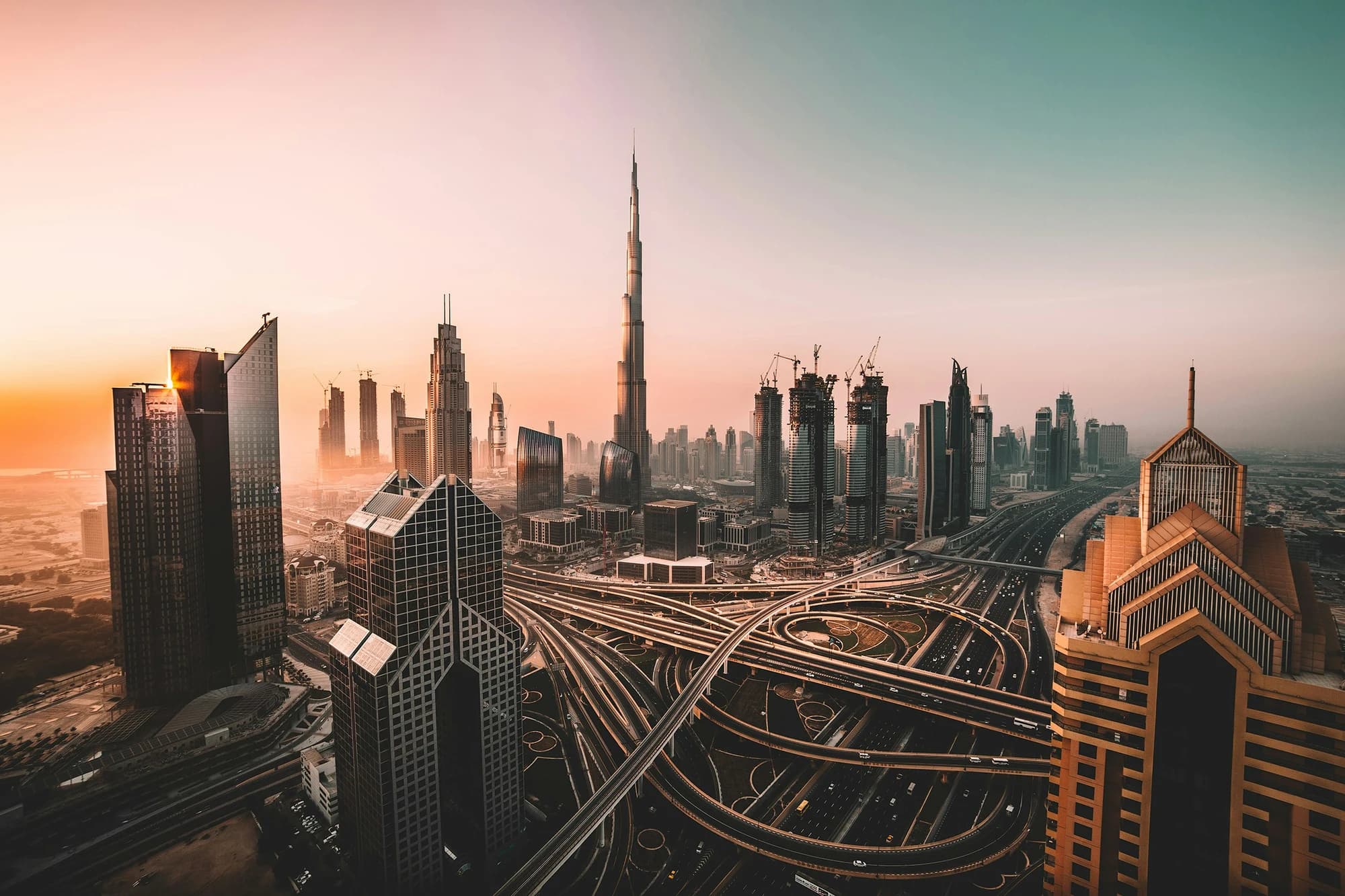 View of Dubai skyline with Burj Khalifa at sunset